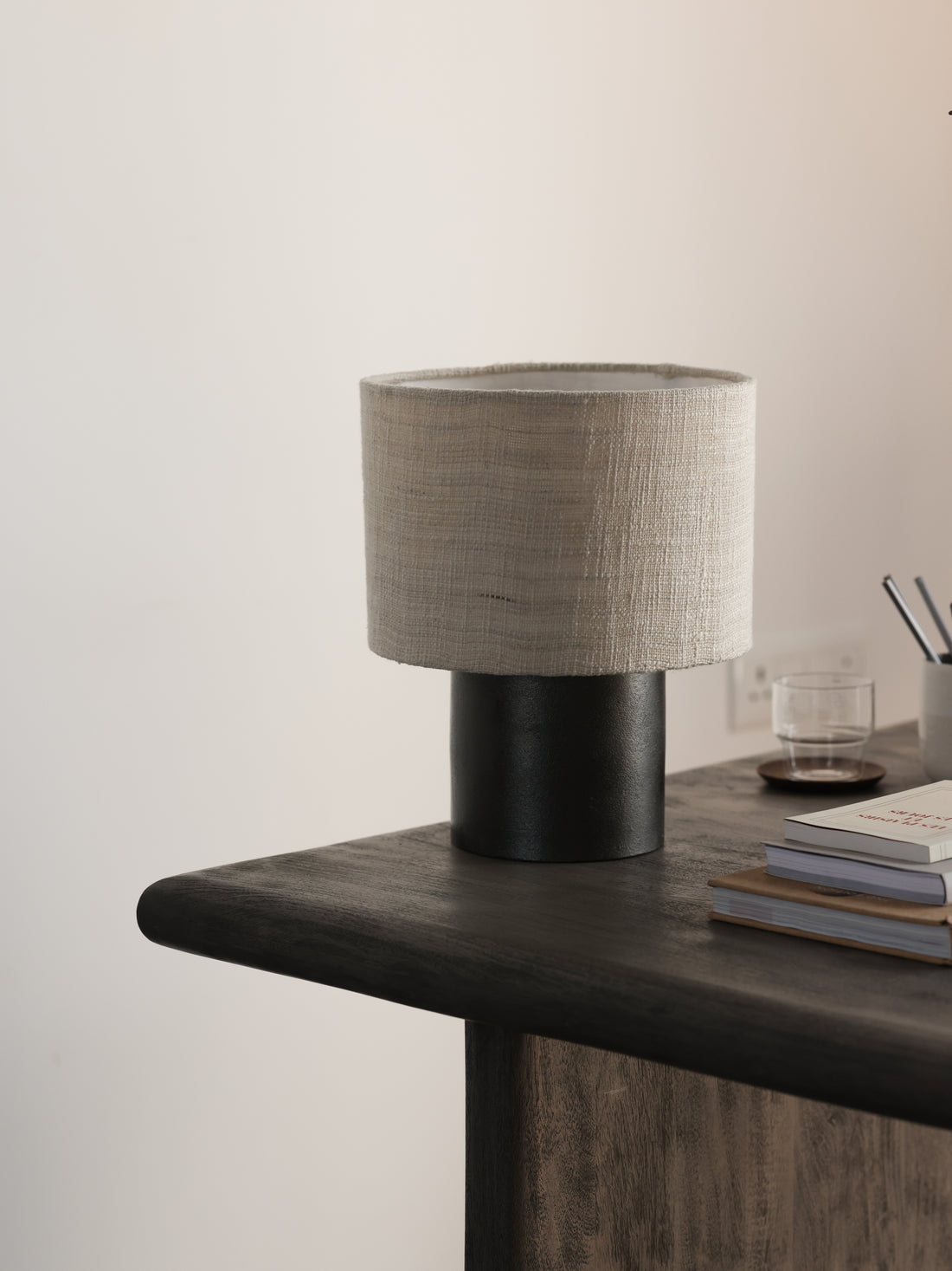 Our exclusive Noir black table lamp is great on a side table, desk or console table. Explore the entire Noir collection.