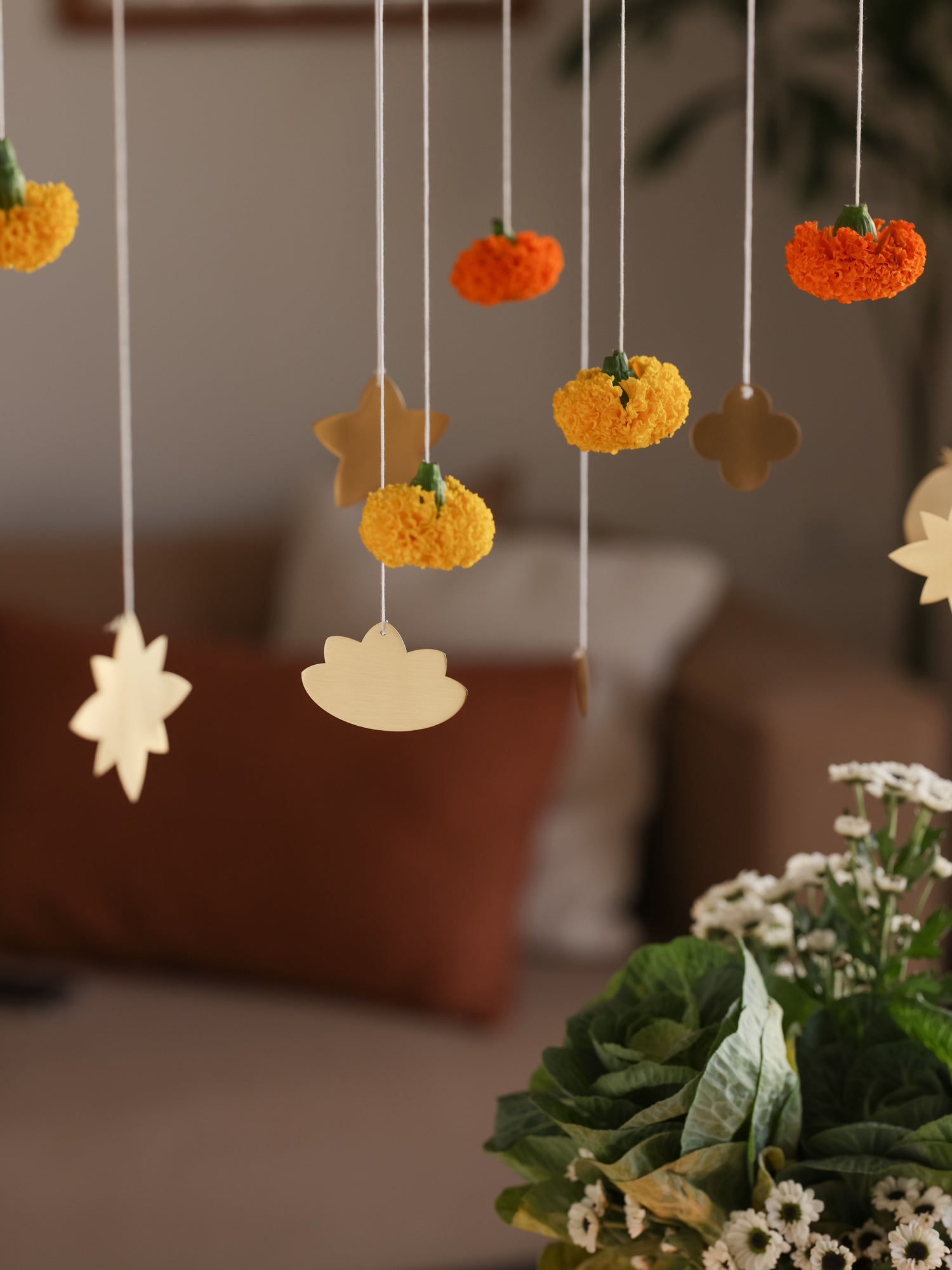 Foliage brass hangings close up