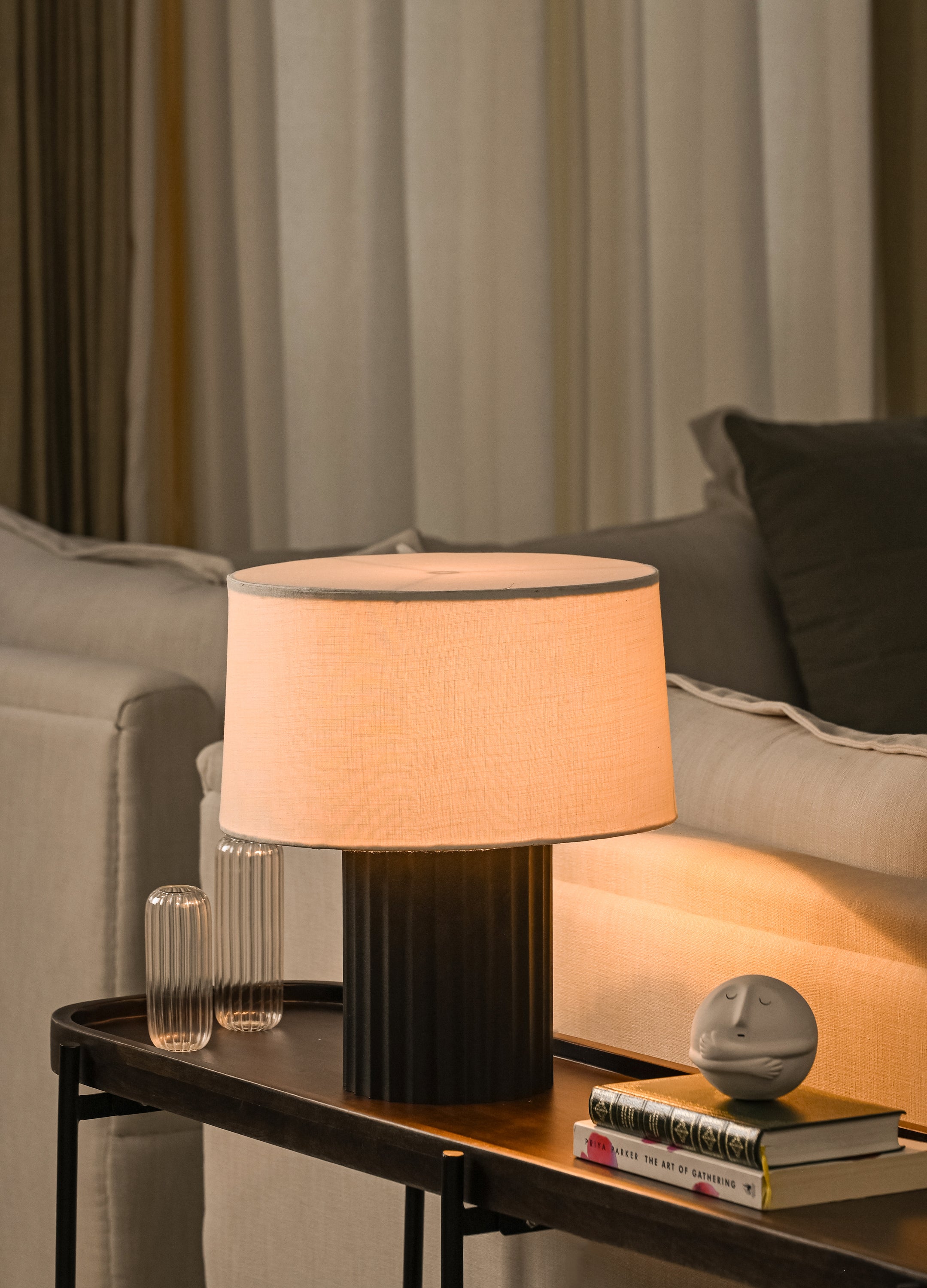 Origami table lamp in the living room setup.
