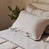 Organic Cotton Percale Flat Sheet in grey with pillow covers.