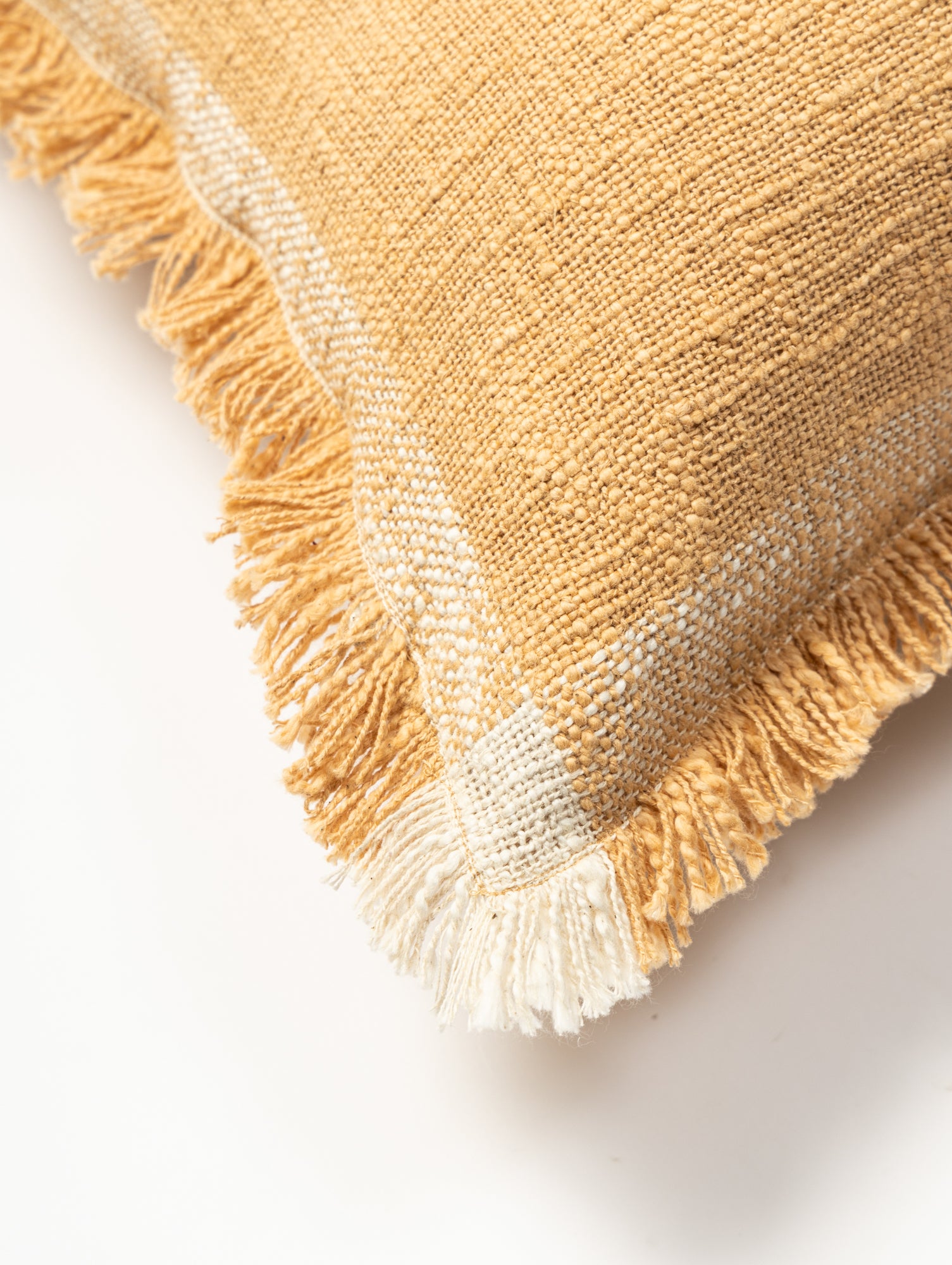 Woven cushions cover white and beige.