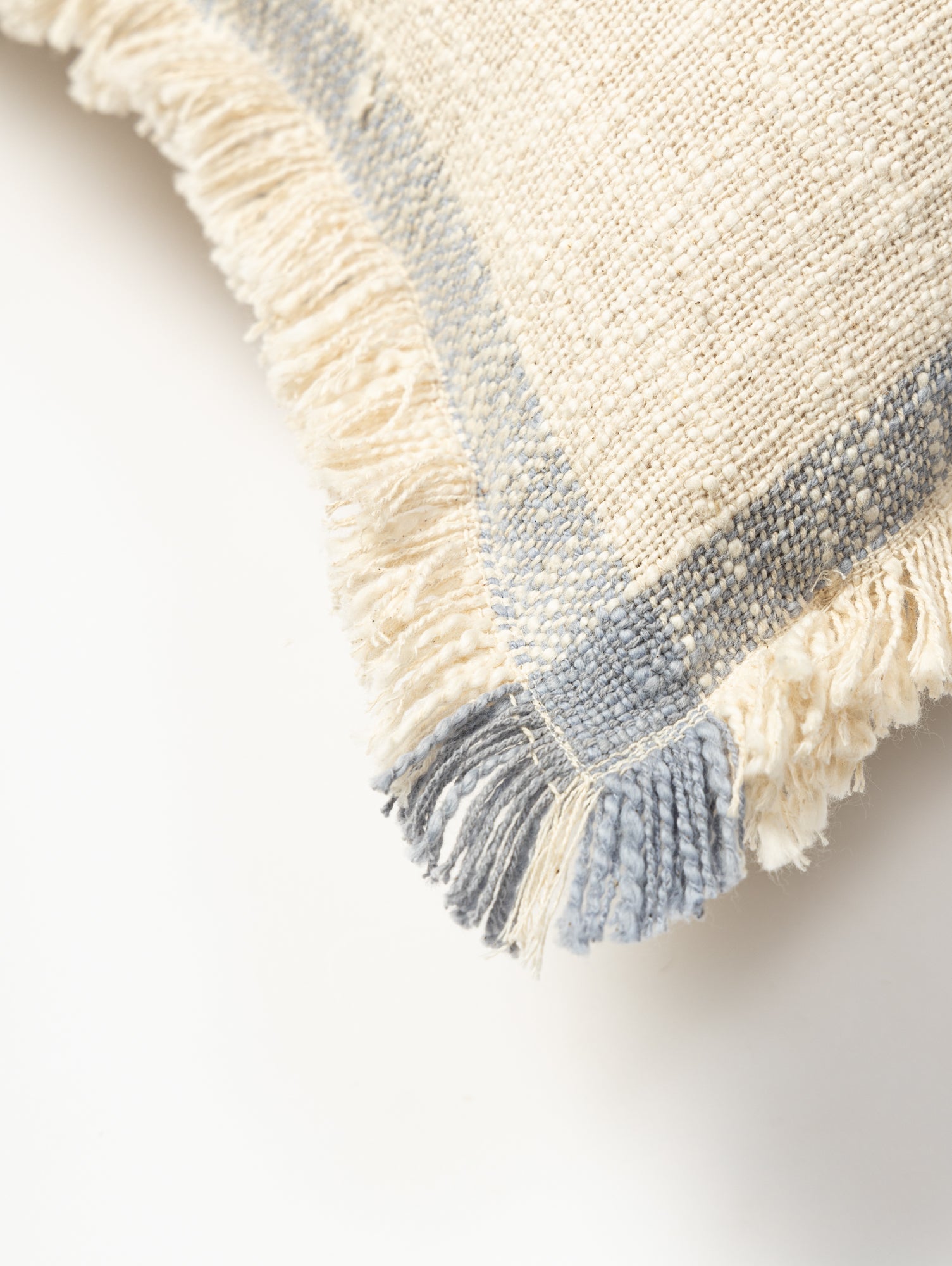 White and blue cushion cover.