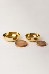 Brass Urli Bowls With their wooden stand.