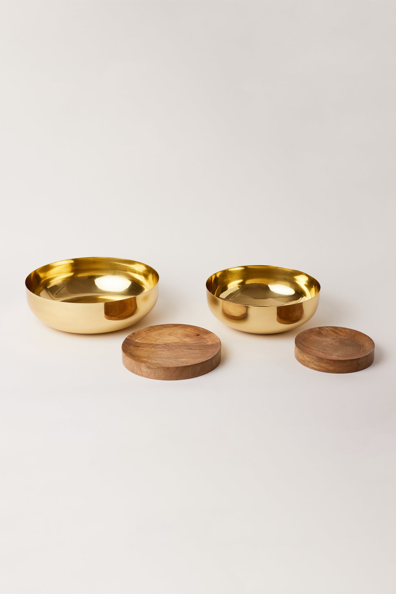 Brass Urli Bowls With their wooden stand.