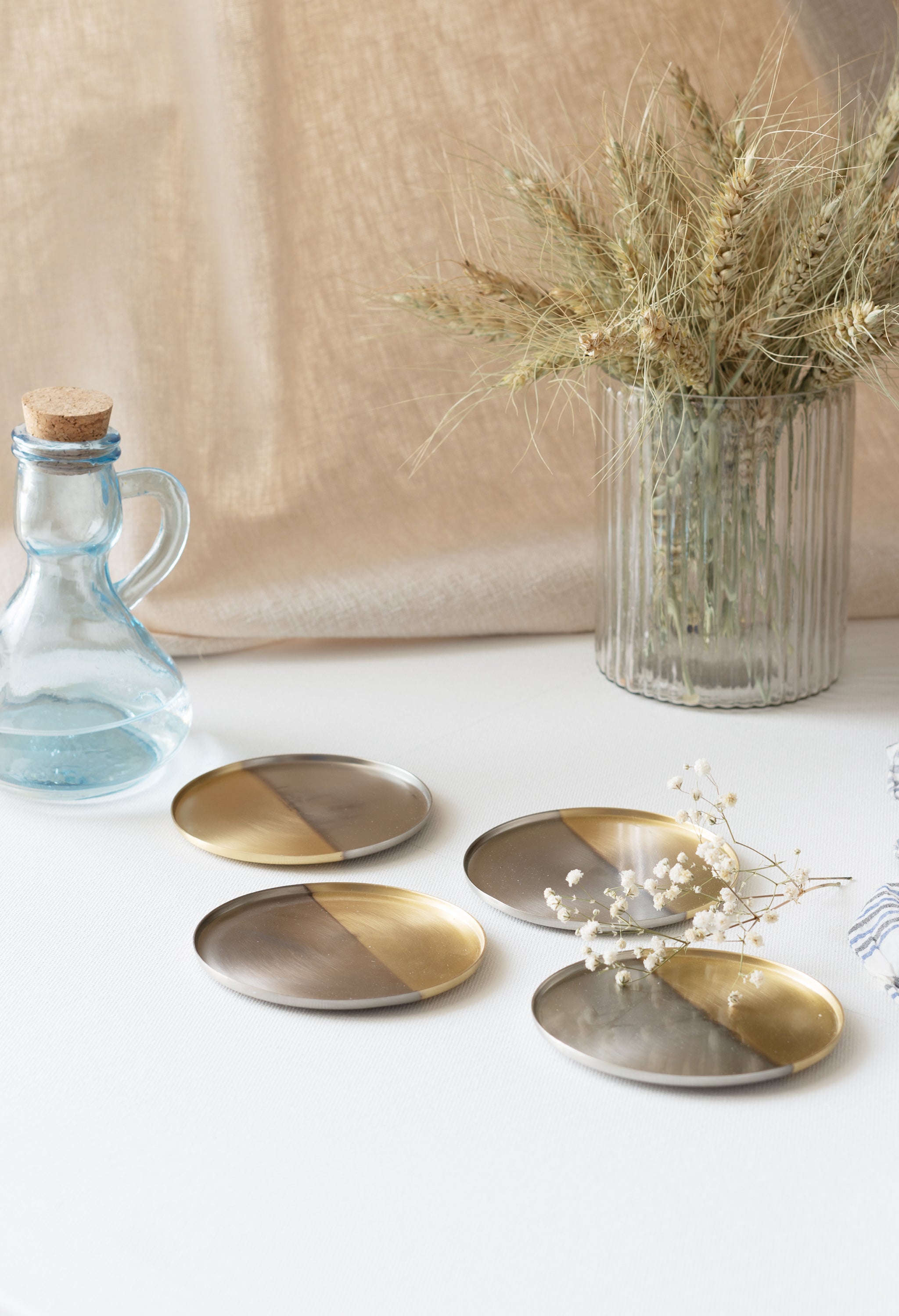 Brass and nickel coaters for dining or coffee table.