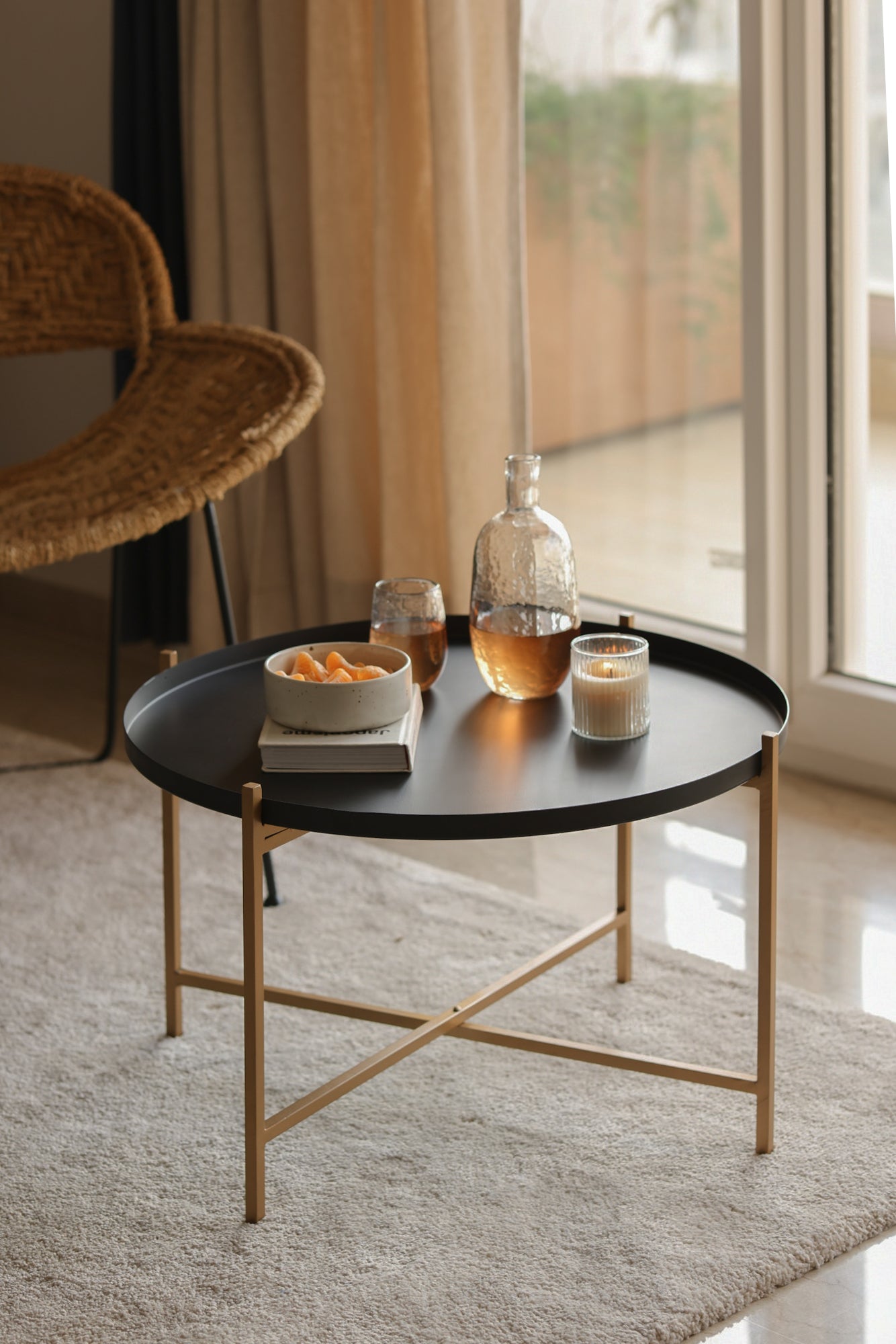 Metal side table in a living room with Black tray.