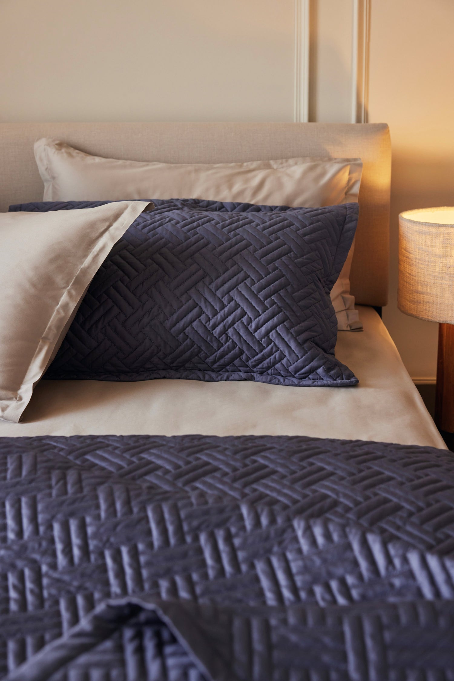 Dusk basketweave quilt set made with 100% organic cotton sateen layered with pewter percale bedding