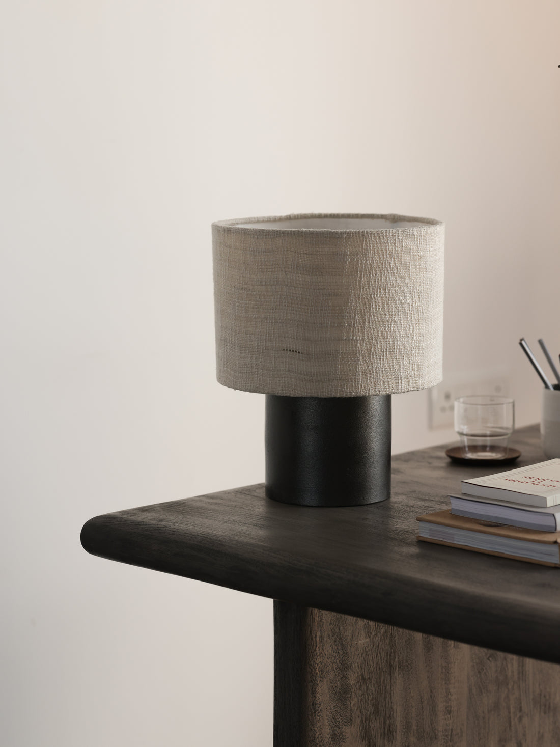 Our exclusive Noir black table lamp is great on a side table, desk or console table. Explore the entire Noir collection. 