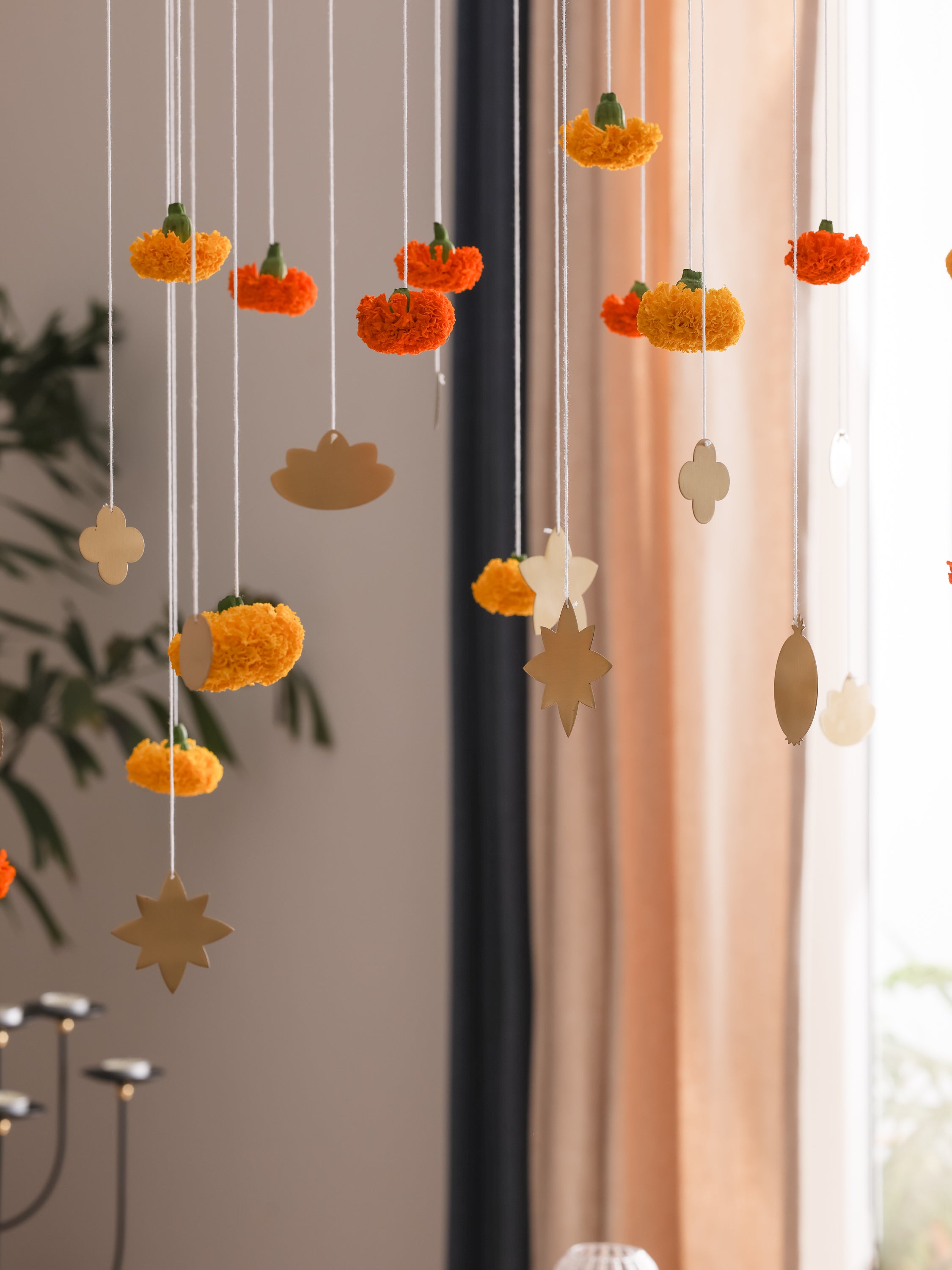 Foliage brass hangings with flowers