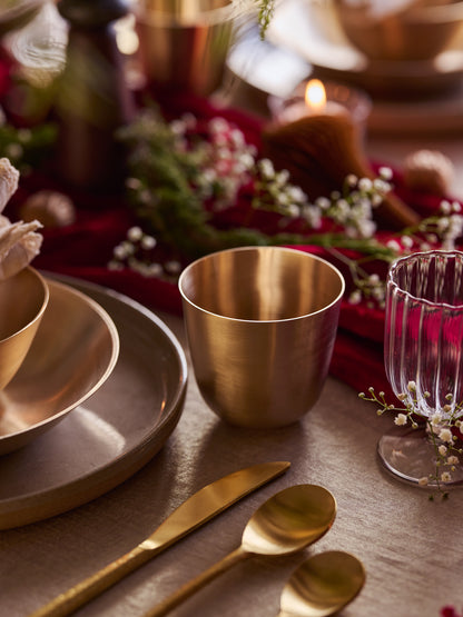 Brass tumbler for coffee.