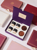 Gift Boxes Closed with purple open with cups and coasters