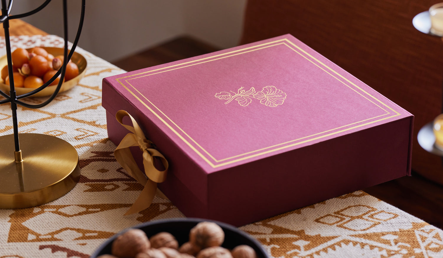 Gudhal gift box with foil printed flowers and a ribbon