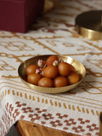 Heirloom brass tapas plate with gulab jamun