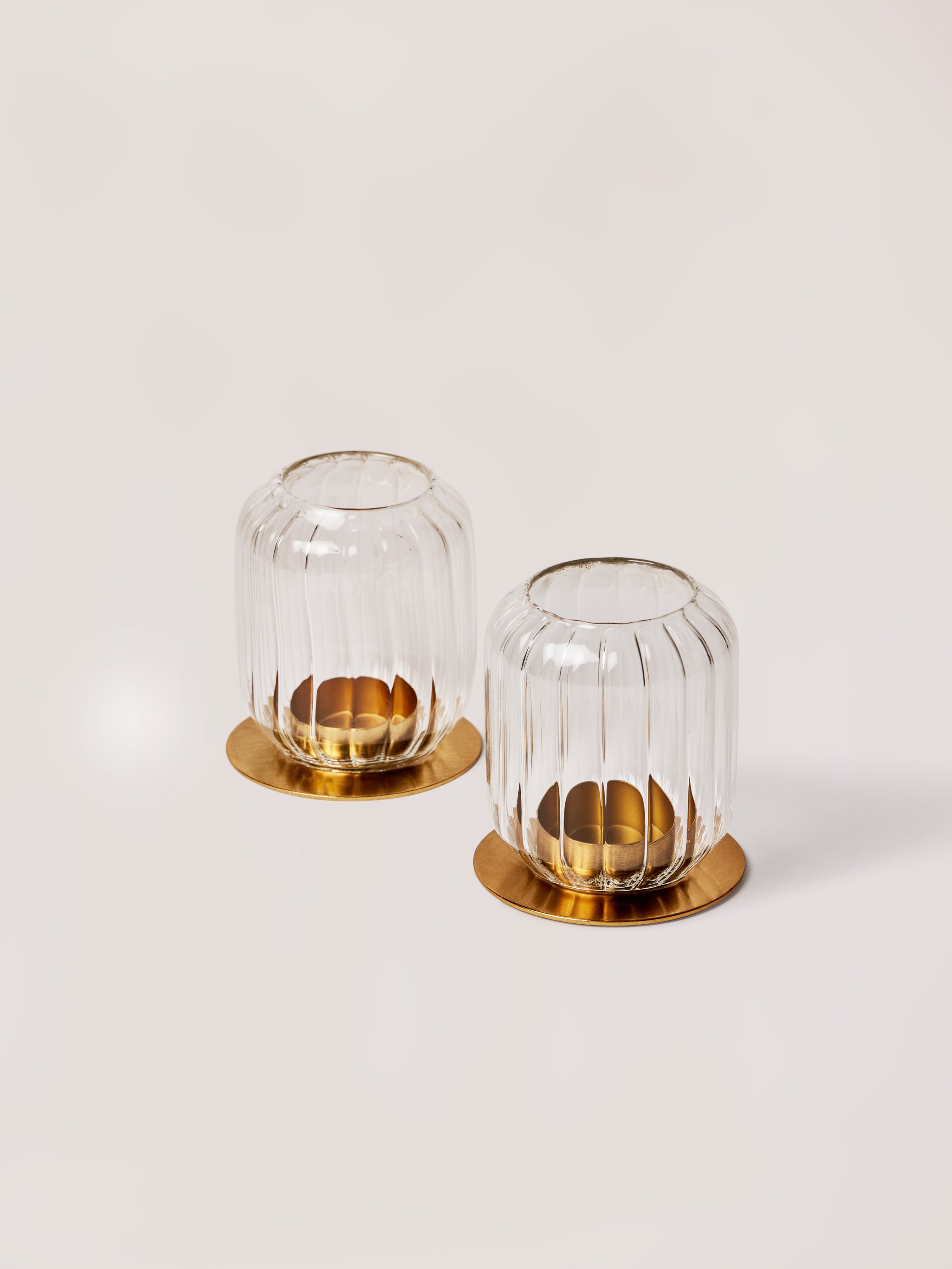 Kira glass lanterns with gold bases set