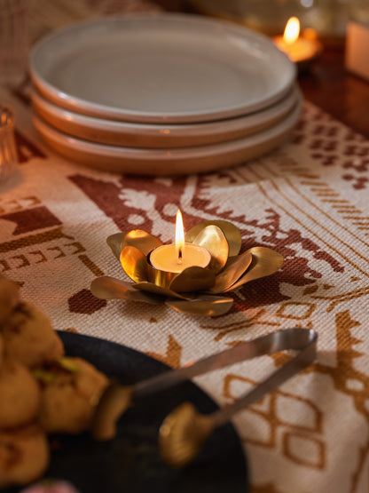 Handmade brass lotus tealight holder with hand-molded petals, crafted in India