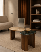 Modern living room with wooden coffee table and decorative items.