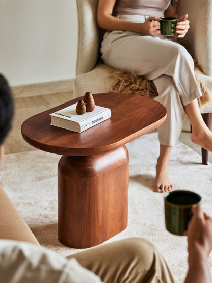 Oblong side table with a modern design.