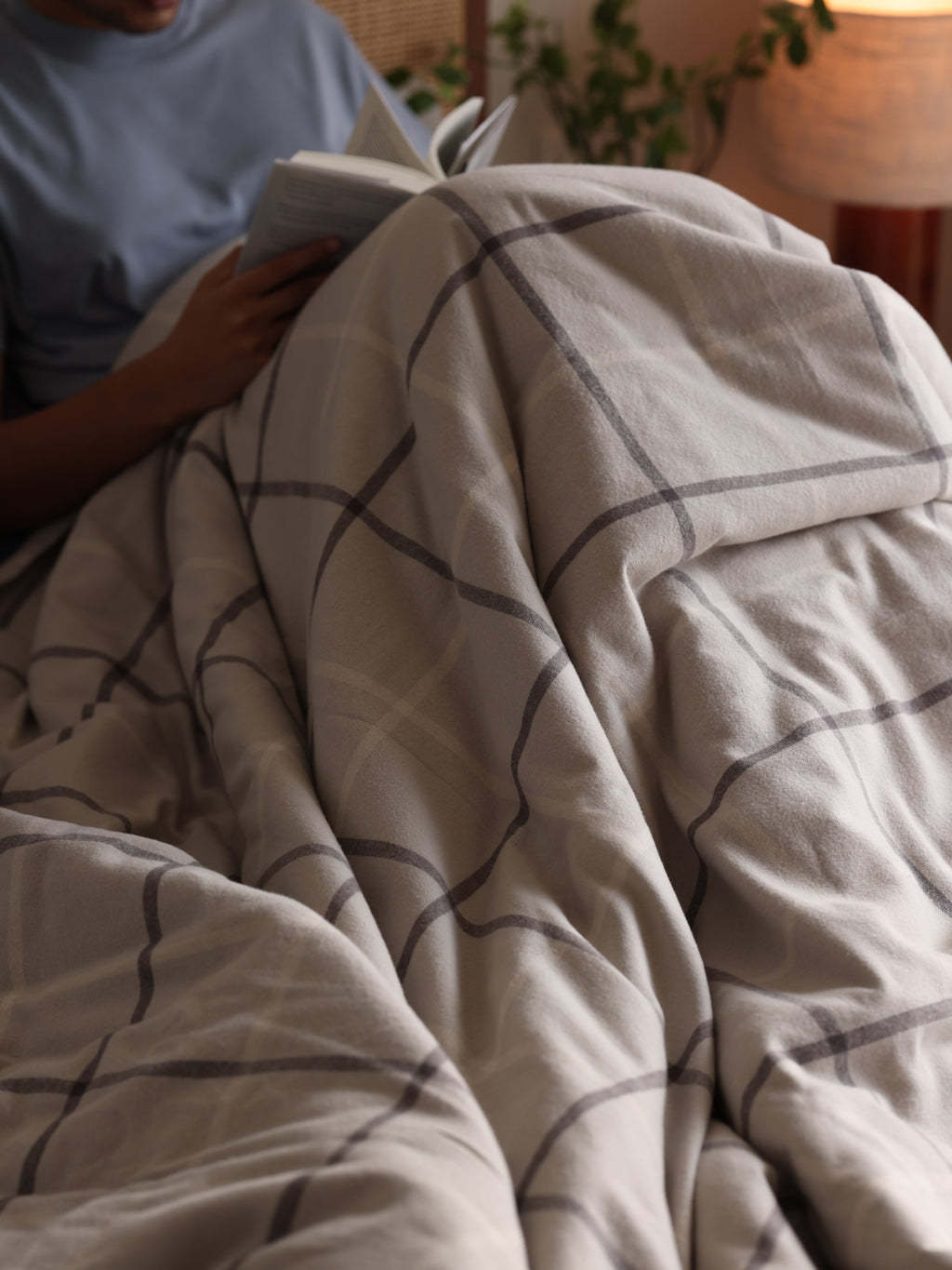 Plaid Brushed Flannel Duvet Cover With a Person Reading a book 
