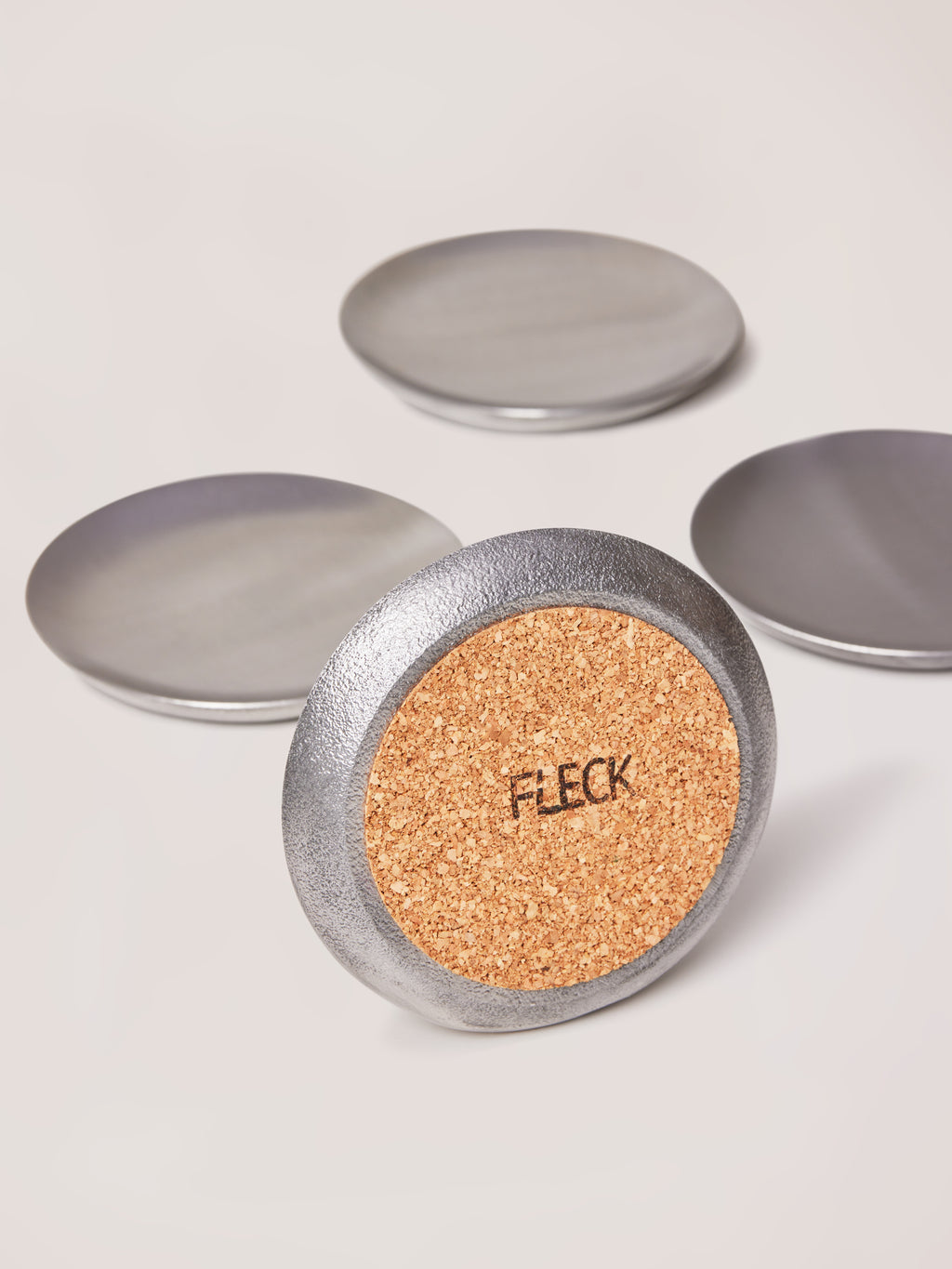 Raw aluminium casted coasters for living room