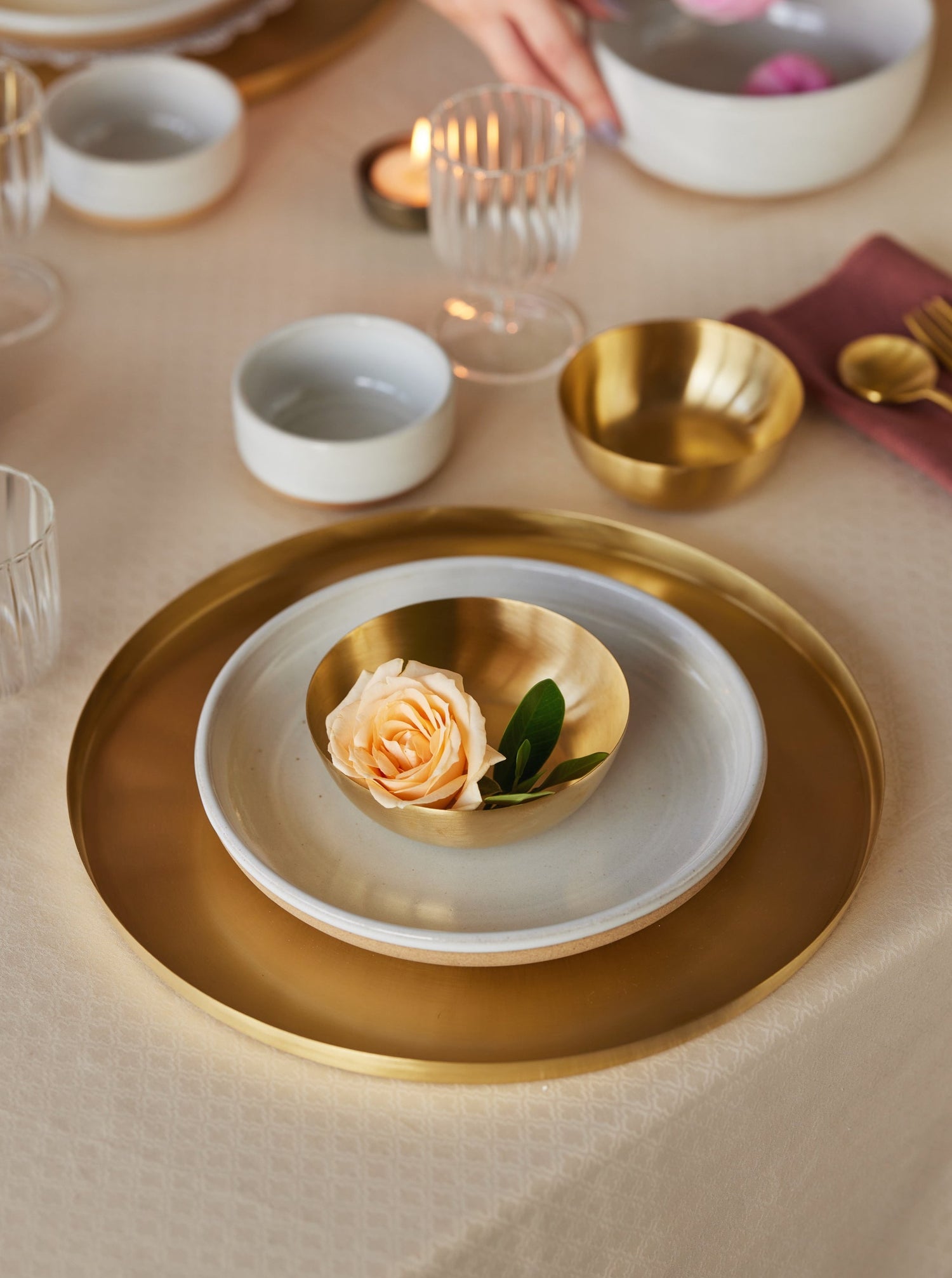 Snowdrop side plate with heirloom brass plate and a peach rose
