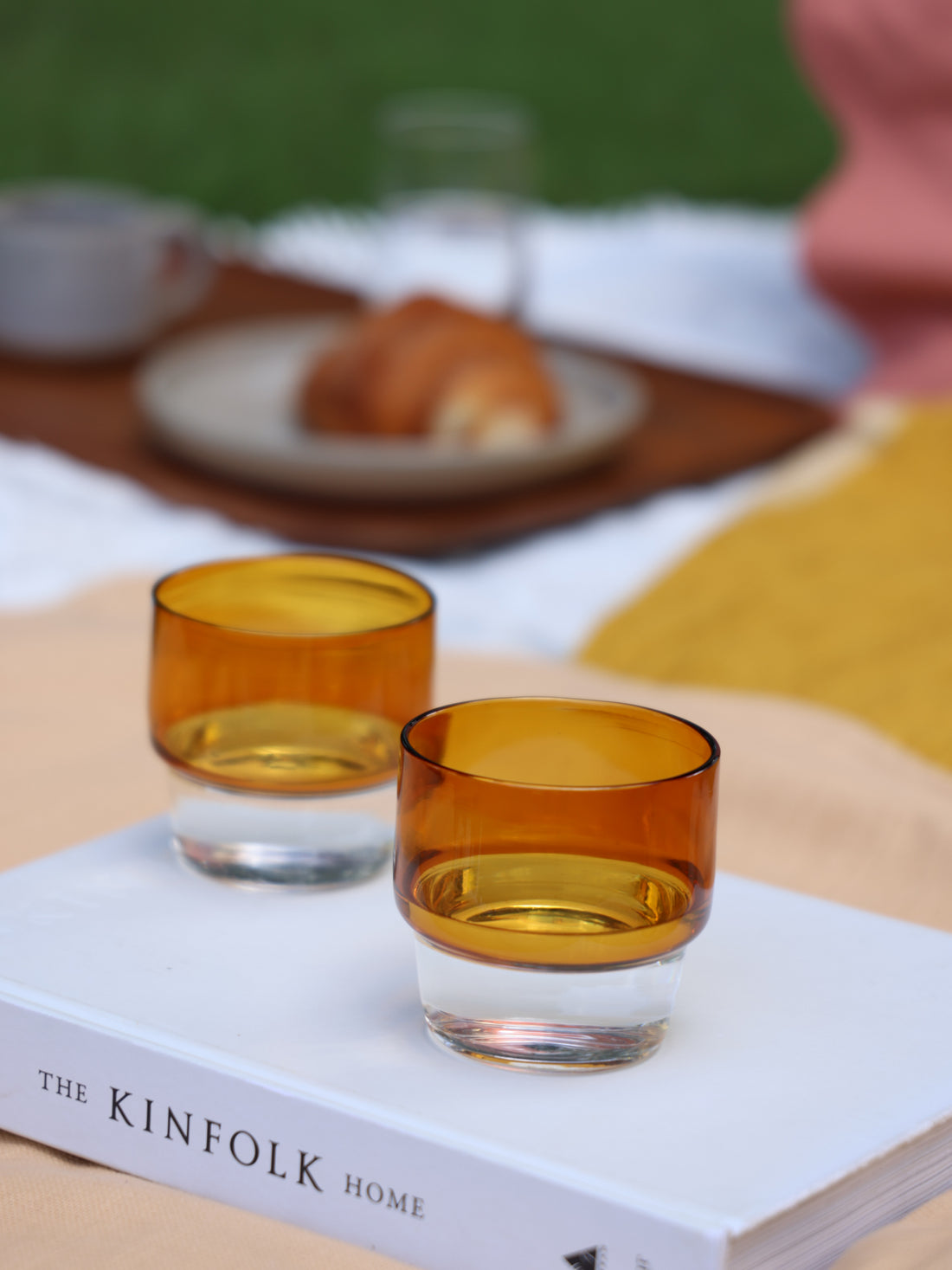 Stackable glasses in amber.