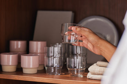 Stackable Tumblers with one glass tumbler in hand