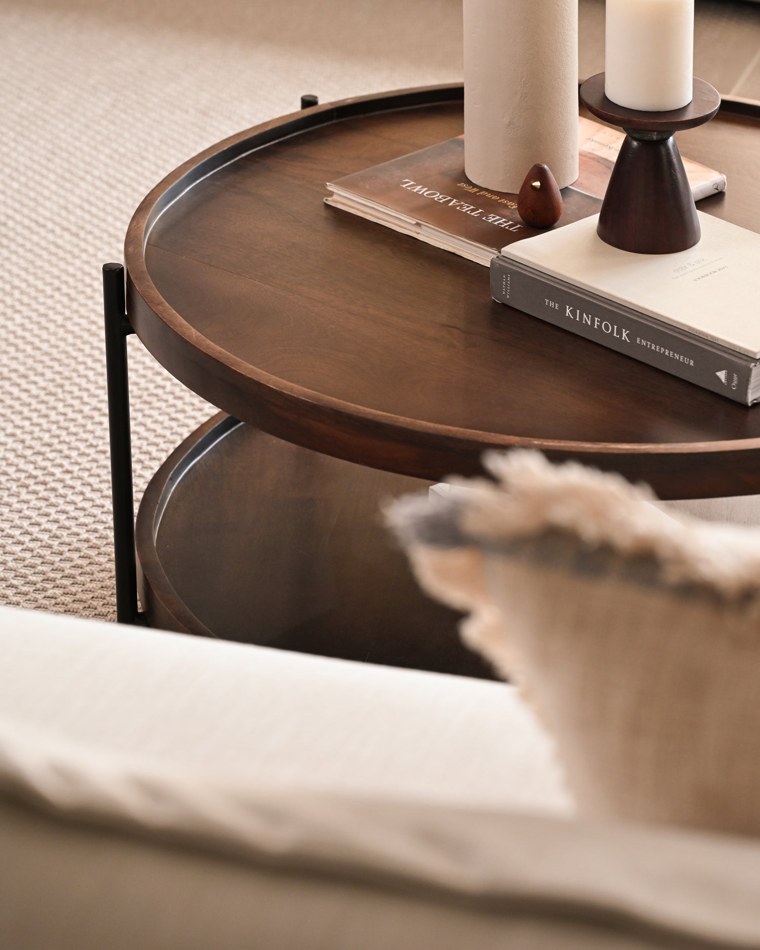 Closeup of the small coffee table with black metal frames.