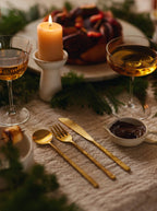 Spoon, fork and knife set in brass.
