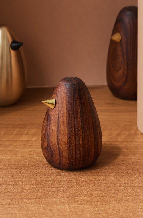 Wood and metal bird's decor pieces.