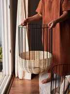 Cabo Natural Rattan Baskets for storage and laundry.