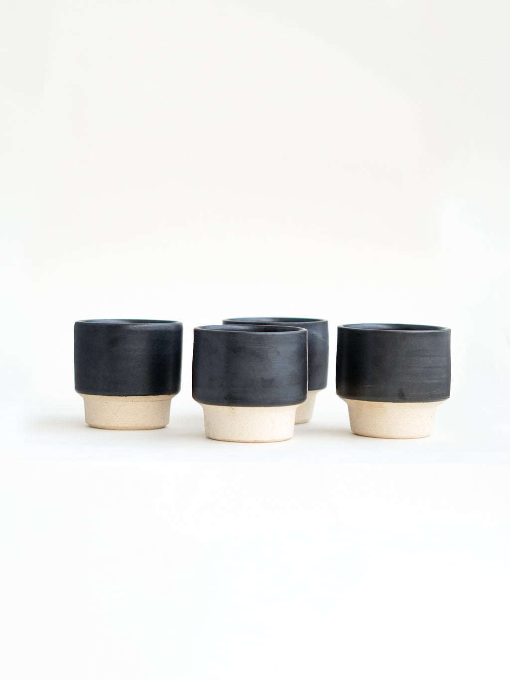 Black mugs for coffee.