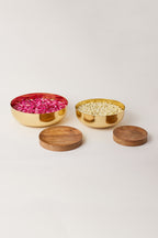 Fleck Footed Brass Urli bowl filled with flowers along with Wooden Bases