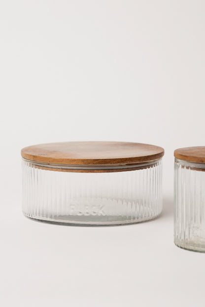 Glass jar with wooden lid for kitchen