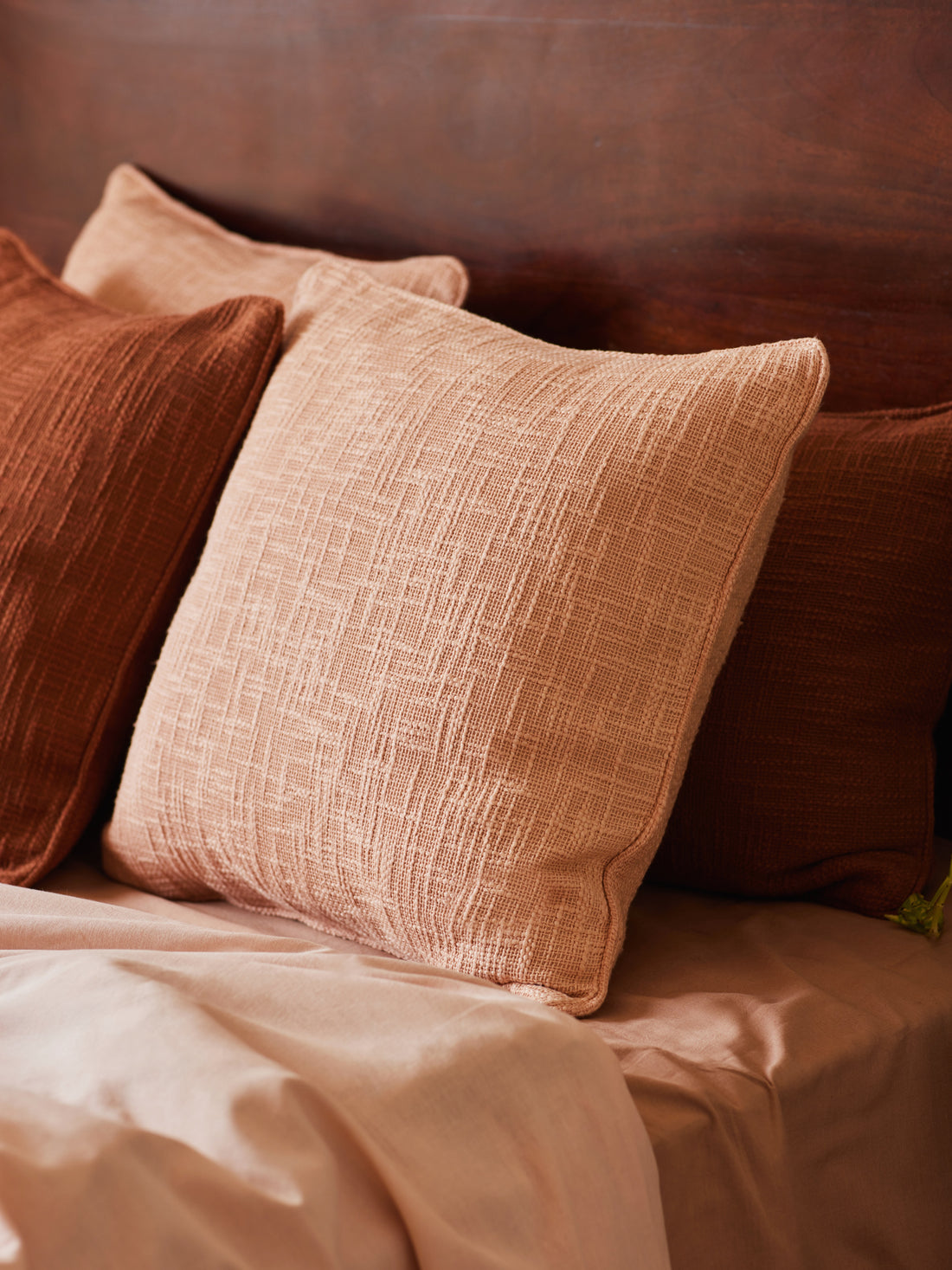 Pink cotton cushion cover with piping