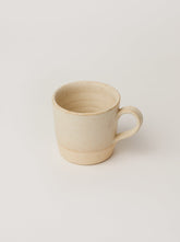 Maṇal white ceramic Coffee mugs by fleck