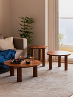 Solid wood round tables by Fleck