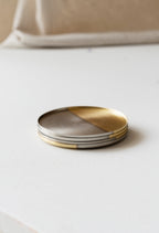 Golden and silver coasters.