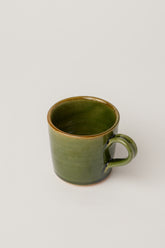 green ceramic Coffee mugs by fleck